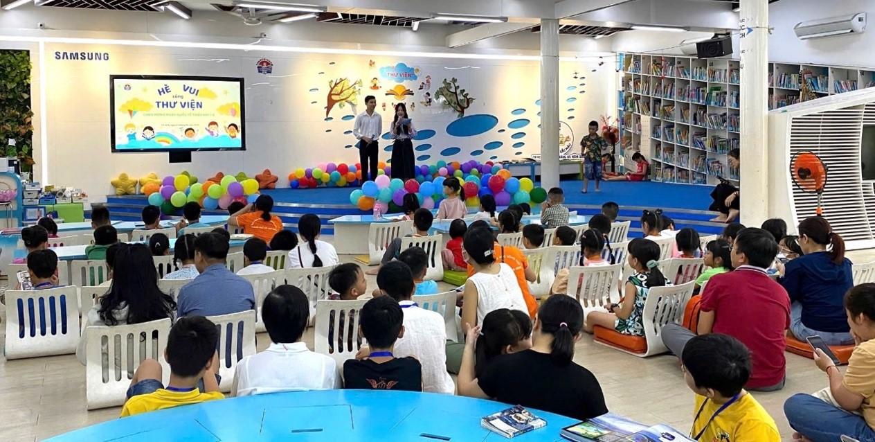 Trẻ em biểu diễn văn nghệ hoặc tham gia sự kiện sôi động tại Nhà Thiếu Nhi Quận 9