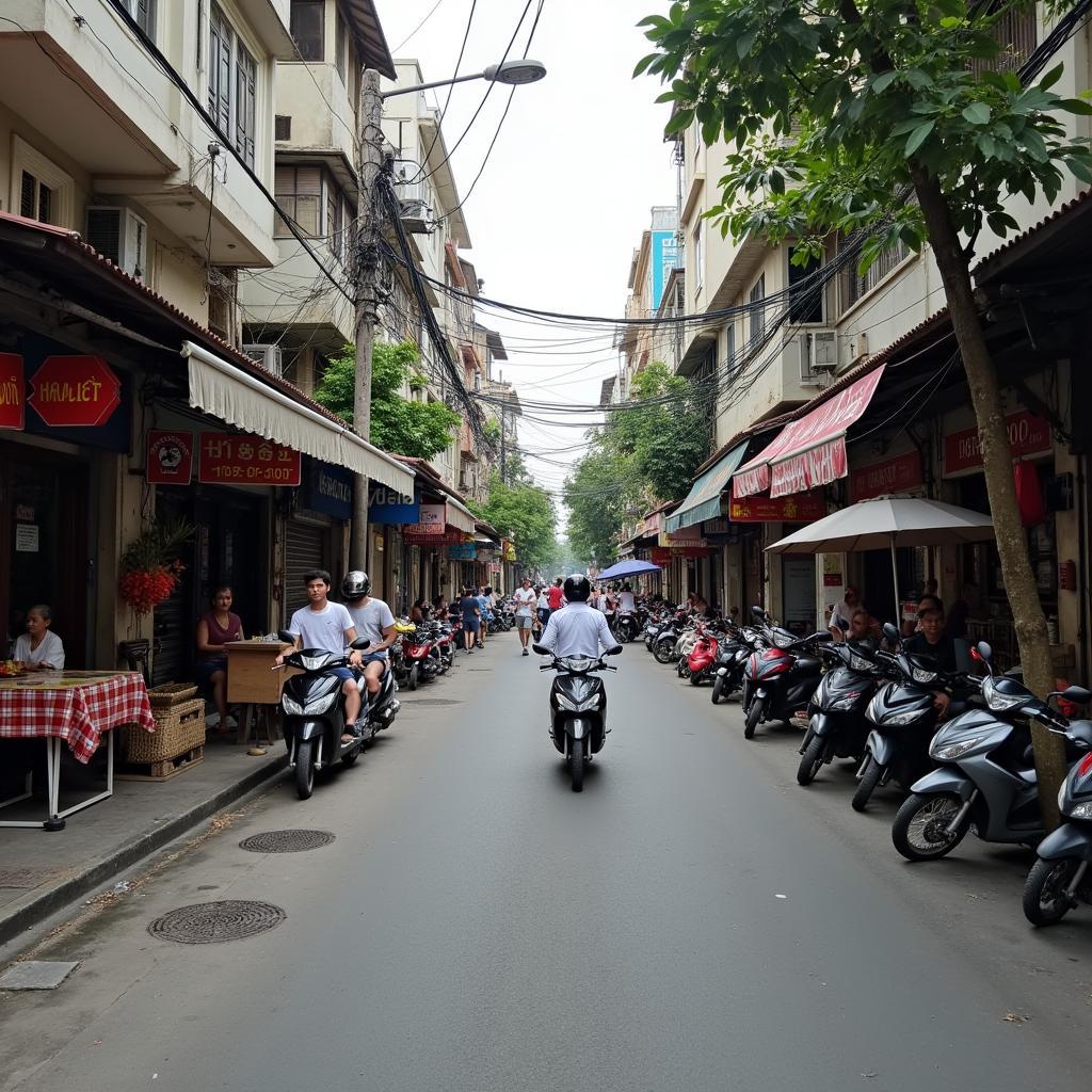 Khung cảnh đời sống thường ngày tại một góc phố ở Phường Hoàng Mai, Quận Hoàng Mai, Hà Nội với các cửa hàng nhỏ và người đi lại.