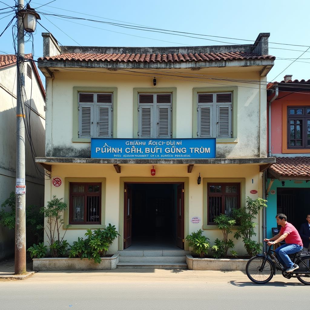 Tru so Dien Luc Giong Trom tai Ap 5, huyen Giong Trom, tinh Ben Tre. Bien hieu lon, de tim.