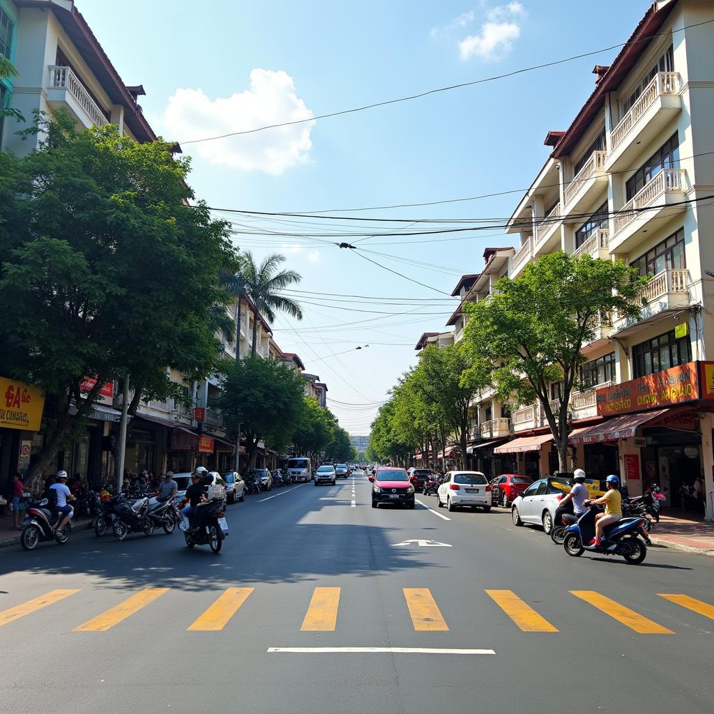 Giao lộ đường Thống Nhất tại Phường Diên Hồng Pleiku với dòng xe cộ qua lại và các cửa hàng kinh doanh hai bên đường