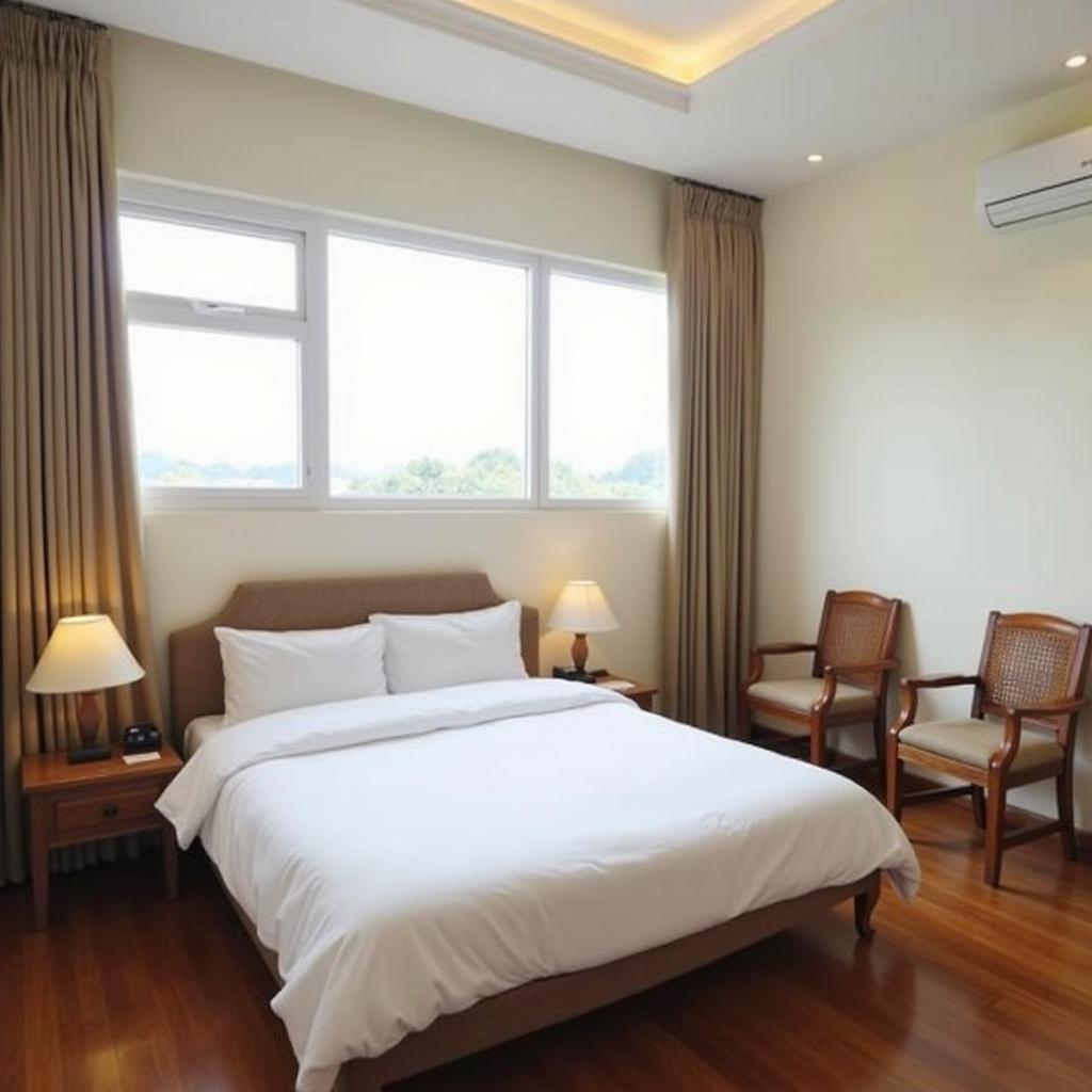 Phòng nghỉ tiêu biểu tại Khách sạn Tuyết Mai Đà Lạt với tiện nghi cơ bản, sạch sẽ