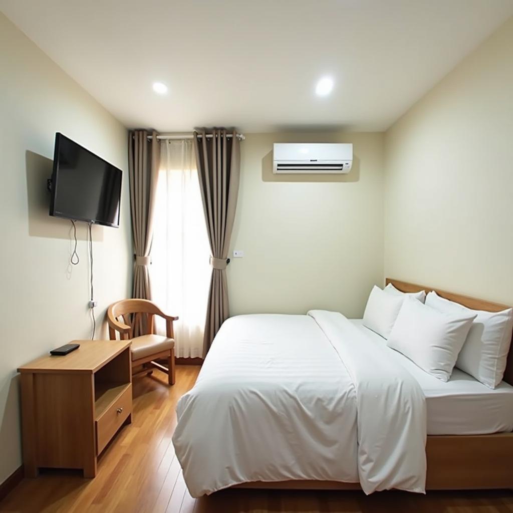 Không gian bên trong phòng nghỉ sạch sẽ, gọn gàng và đầy đủ tiện nghi tại Nhà nghỉ Xuân Mai