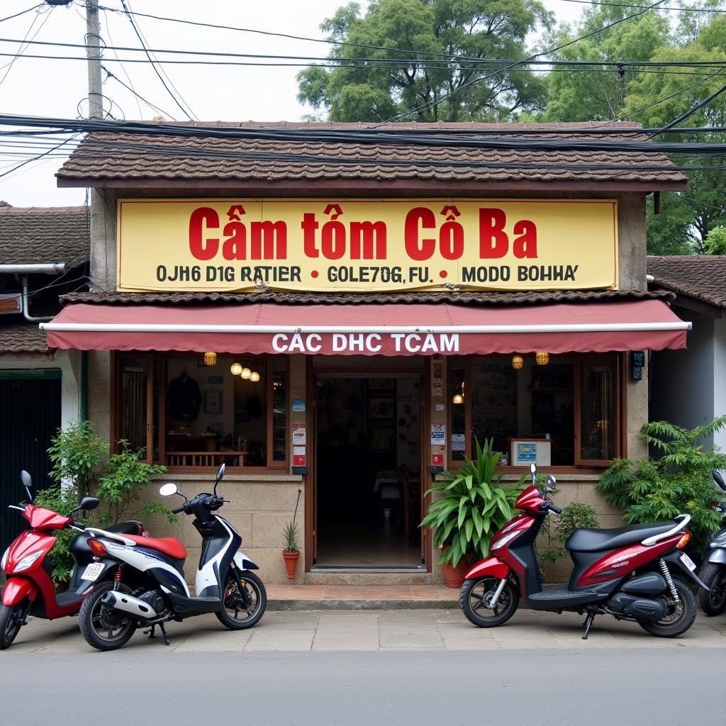 Ngoại cảnh mặt tiền quán Cơm tấm Cô Ba nằm trên Quốc Lộ 30, Cao Lãnh với biển hiệu dễ nhận biết.