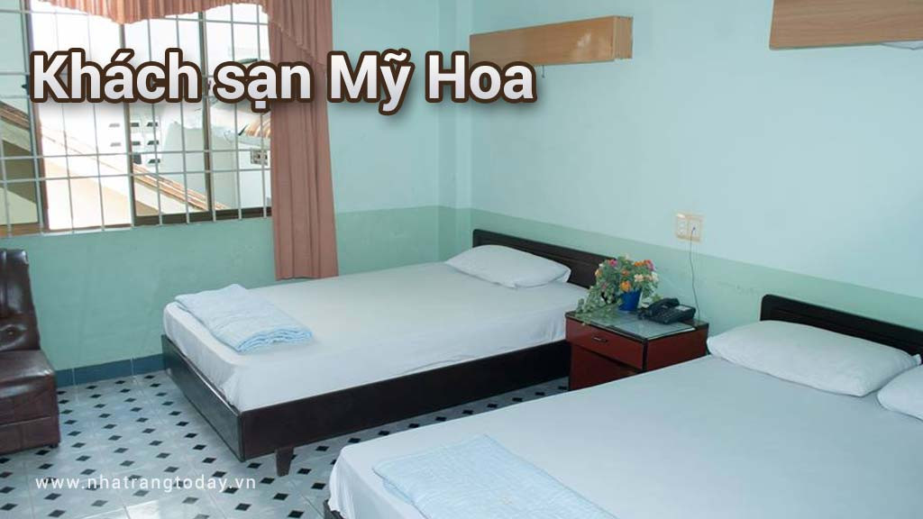 Ảnh tổng quan khách sạn Mỹ Hoa Nha Trang từ trên cao, toát lên vẻ hiện đại và vị trí trung tâm