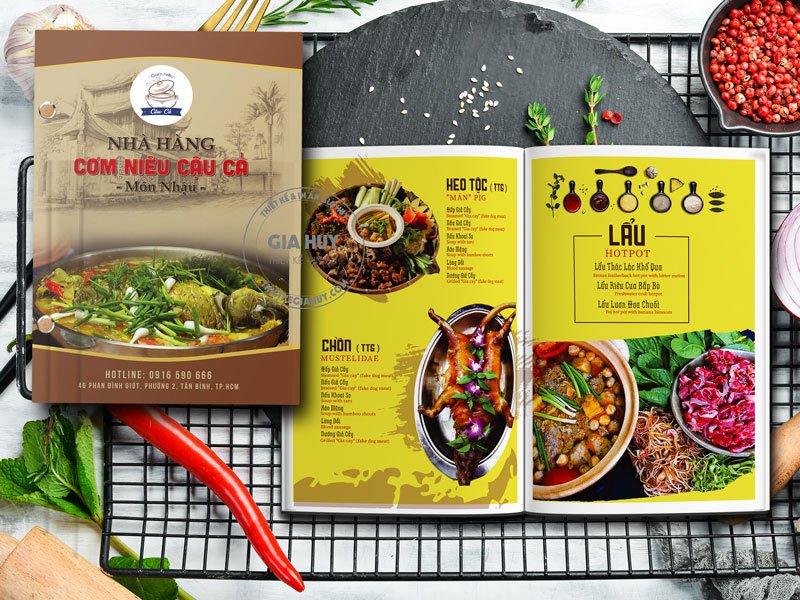 Thiết kế thực đơn quán cơm niêu màu vàng