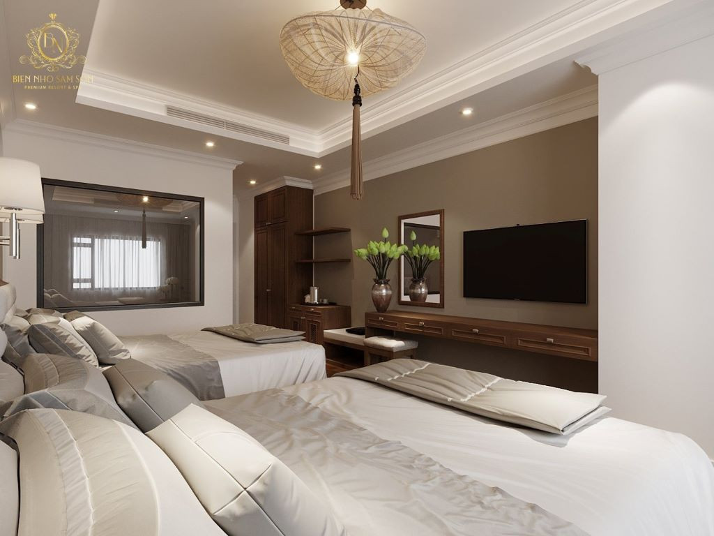 Nội thất phòng Deluxe Hướng Núi tại Khách sạn Biển Nhớ Sầm Sơn với giường đôi rộng rãi