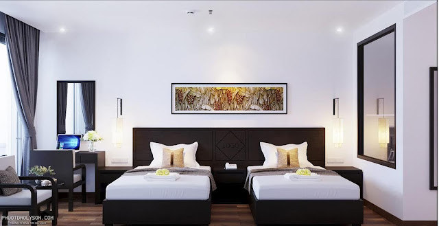 Nội thất phòng Deluxe Ocean and Garden View tại Ly Son Pearl Island Hotel & Resort, với giường đôi và cửa sổ lớn nhìn ra khung cảnh đảo Lý Sơn.