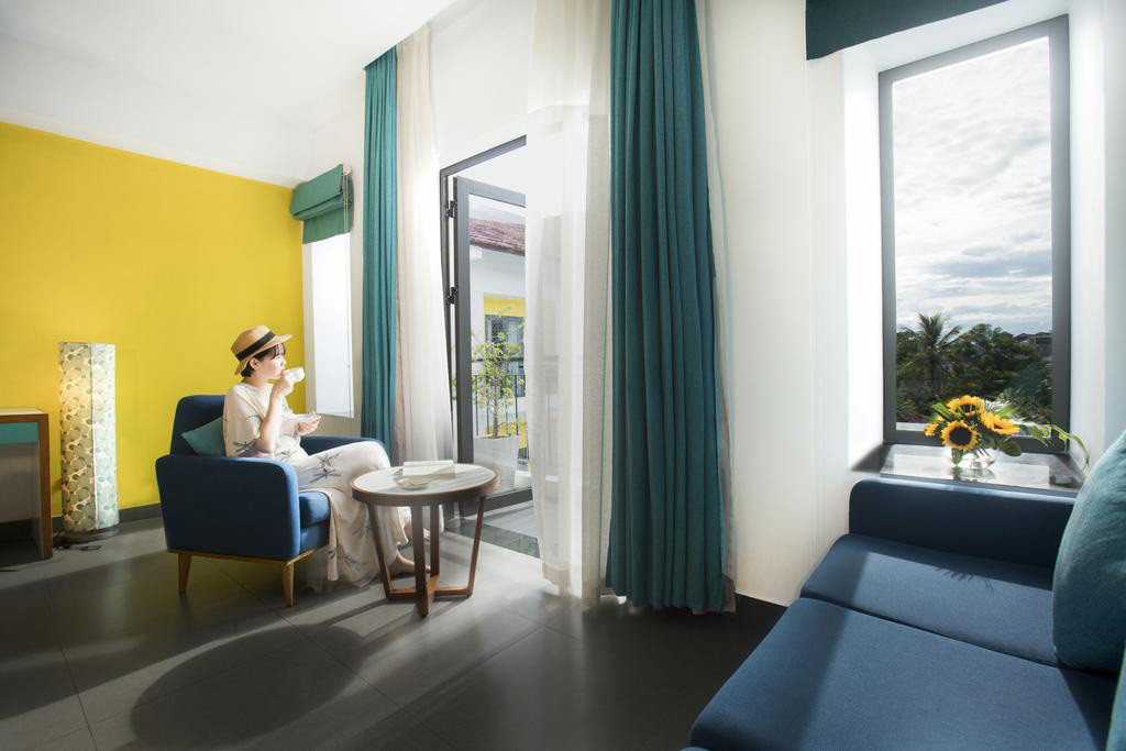 Phòng nghỉ tiện nghi tại ÊMM Hotel Hội An, một khách sạn 4 sao ở Hội An