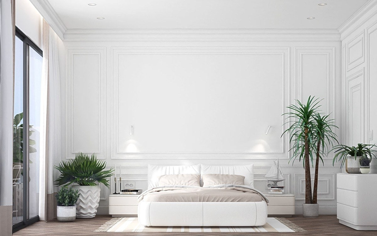 Phòng ngủ khách sạn đẹp và đơn sắc, thể hiện sự tinh tế của các phong cách thiết kế nội thất khách sạn tối giản.