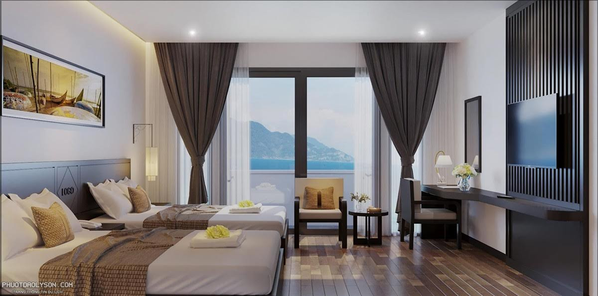 Phòng Suite Family Garden View với giường đôi lớn và không gian ấm cúng, phù hợp cho gia đình tại khách sạn Đảo Ngọc Lý Sơn.