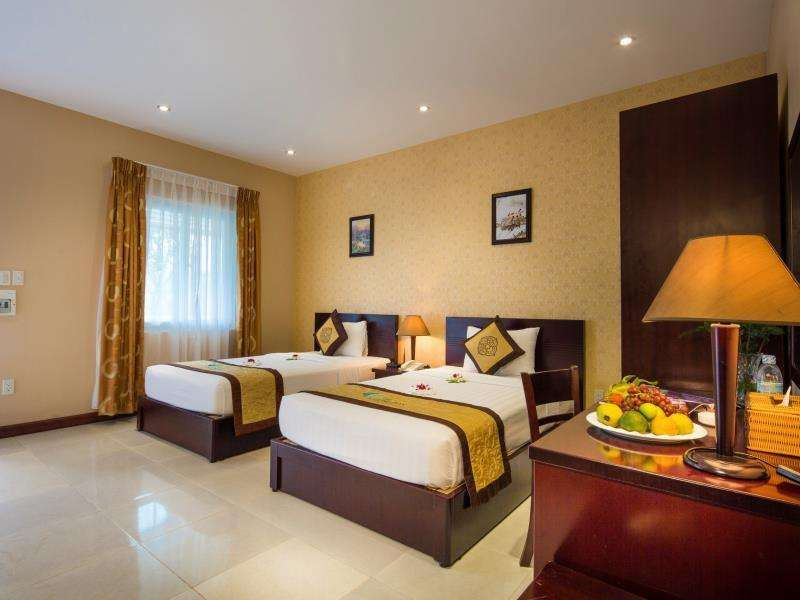 Thiết kế tối giản và ấm cúng tại căn phòng của The Sailing Bay Beach Resort - Khách sạn Mũi Né gần biển